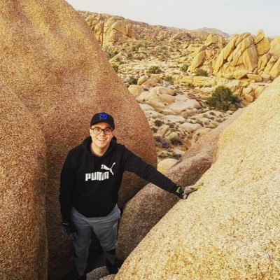 Stefan Snell, hiking among desert rock formations